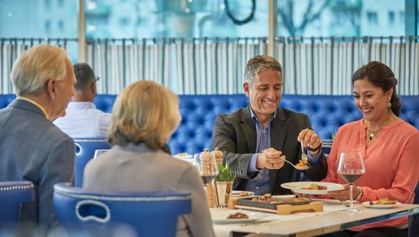 Uniworld passengers can savour 'farm-to-ship' cuisine onboard, crafted from locally sourced, fresh ingredients, offering a range of choices from lighter dishes to vegan alternatives.