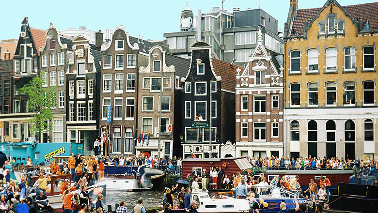 Amsterdam’s increase in tourism tax aims to fund local improvements.