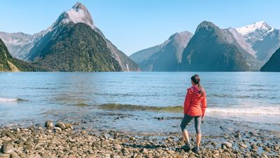 New Zealand’s prime minister says foreign visitors should contribute to the upkeep of popular tourist spots, such as Milford Sound.