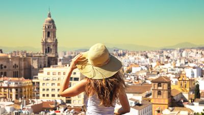 Locals are plastering stickers on buildings expressing their unhappiness with the overtourism.