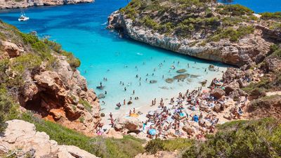 More than 20,000 protestors march in Mallorca, reflecting increasing Spanish anger over the impacts of mass tourism on local life.