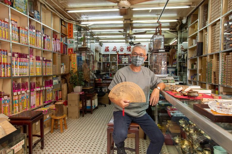 Meet locals and discover unique aspects of West Kowloon's rich heritage and vibrant street life in Yau Ma Tei and Jordan. Pictured: Lowell Lo, shopkeeper of Cheung Shing Fans Factory.