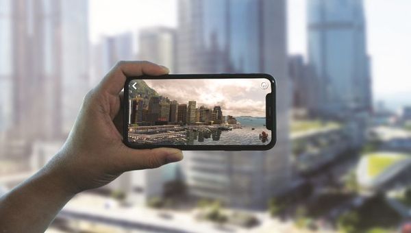 In the City in Transition mode of the AR App, images of Hong Kong in the 1960-1980’s overlay what is seen today.