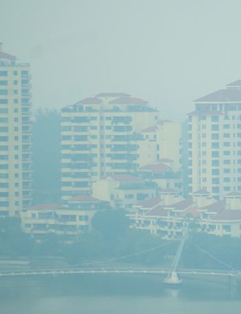Haze shrouds waterfront residential towers at Tanjong Rhu, Singapore.