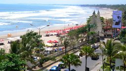 Calls for Bali's tourism moratorium originated from local communities, environmental groups, the Indonesian government, and the interim governor, citing concerns about overtourism and its negative impacts.