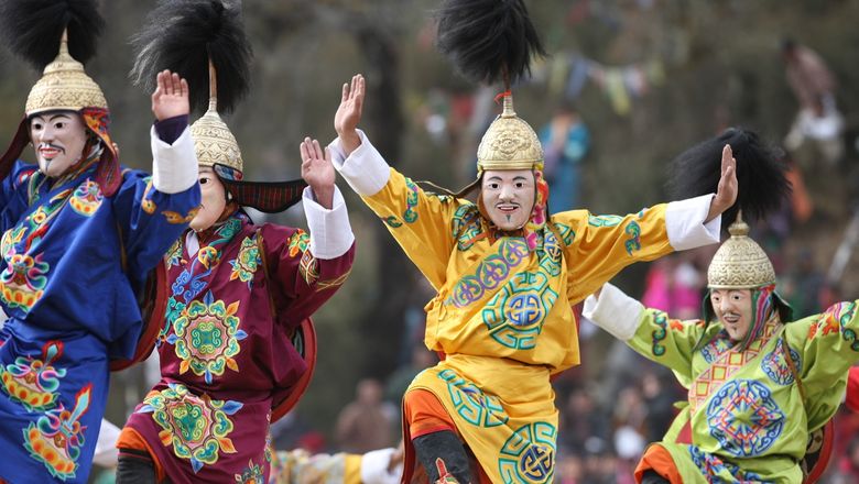 Masked dancers at the Druk Wangyel Tsechu festival.