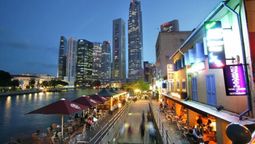 Night-time view of Boat Quay, along the iconic Singapore River.