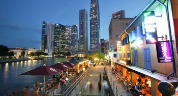 Night-time view of Boat Quay, along the iconic Singapore River.