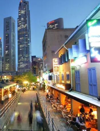 Night-time view of Boat Quay, along the iconic Singapore River.