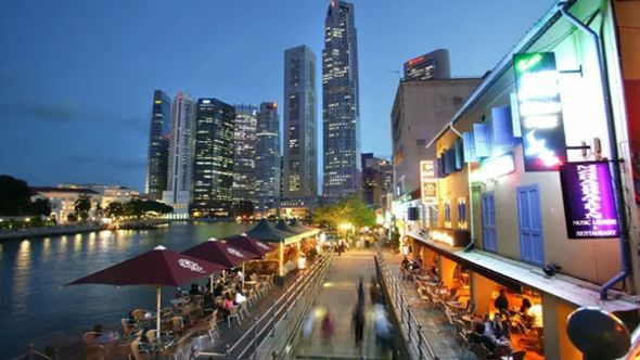 Night-time view of Boat Quay, along the iconic Singapore River.