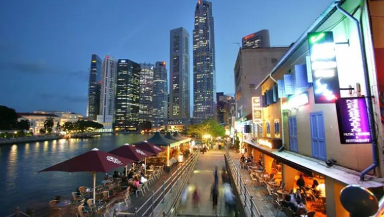 Night-time view of Boat Quay, along the iconic Singapore River.