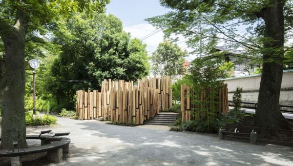 Five toilet huts at Shonto Park covered by cedar boards.