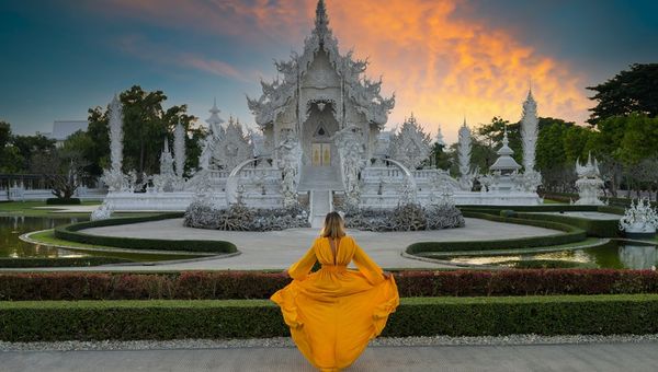 Wat Rong Khun (White Temple), is a contemporary Buddhist temple in Chiang Rai, Thailand, known for its striking white facade, symbolism, and intricate architecture.