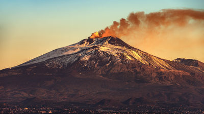 Mount Etna, Europe’s tallest active volcano in Sicily, is known for frequent eruptions, rich volcanic soil, and attracting scientists and tourists worldwide.