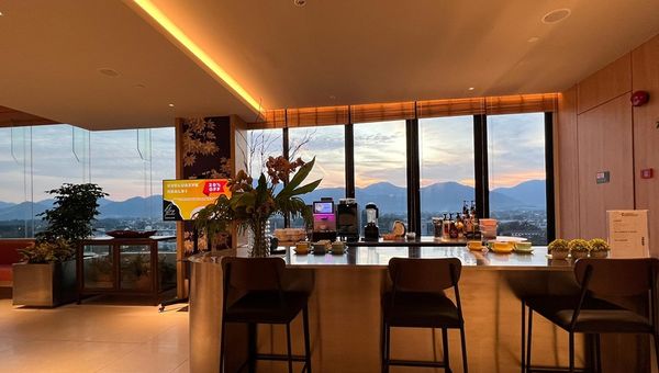 The Terrace Coffee Bar in Ipoh offers a spacious setting with stunning city views, serving premium beverages, perfect for relaxing after exploring the bustling Memory Lane market.