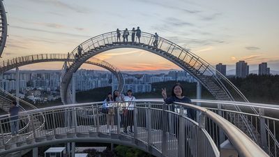 Hwanho Park Space Walk, a walkable steel "roller coaster", gave the travel agents a stunning sunset view of Pohang.