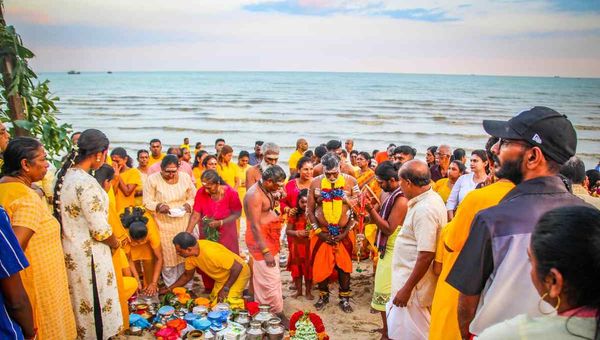 Masimagam Theppa Thiruvizha is an annual Hindu festival in Penang, featuring a floating chariot procession honoring the goddess Singamuga Kaliamman.