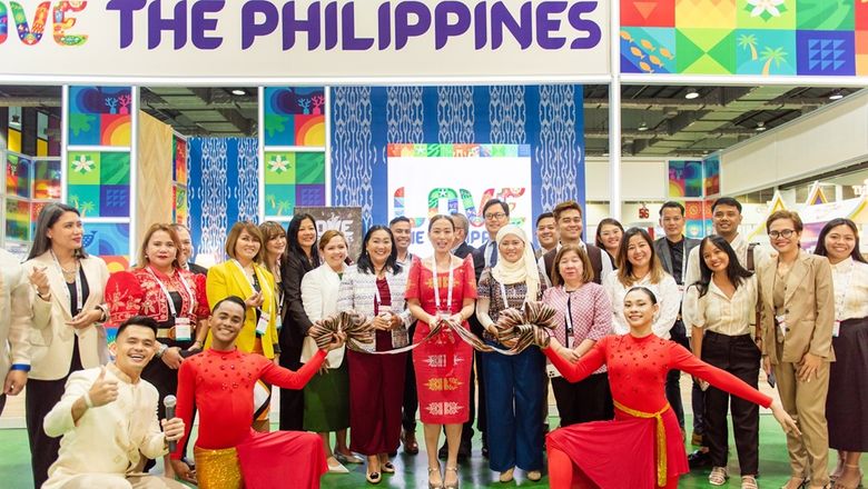 Tourism Promotions Board COO Maria Margarita Montemayor Nograles (center) inaugurates the Philippines' exhibition booth at the ASEAN Tourism Forum 2024.