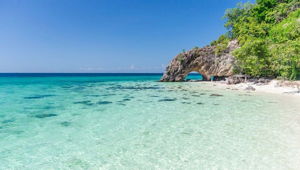 Tarutao National Park, near Koh Lipe, boasts pristine beaches, lush rainforests, limestone cliffs, diverse wildlife, sea caves, and remote islands perfect for trekking, kayaking, and snorkelling.