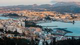 Hundreds of migrants reached Ceuta from Morocco by swimming around the border or using inflatable devices to reach Tarajal beach, overwhelming Spanish border officers.