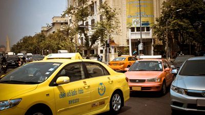 Street in Bangkok with taxis