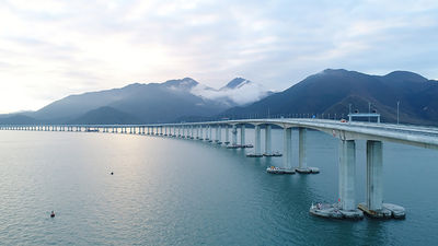 The opening of the 55km bridge connecting Hong Kong and Macau to the mainland Chinese city of Zhuhai marks the longest sea-crossing bridge ever built.