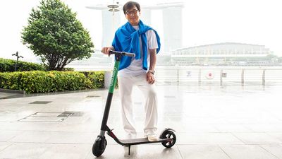 Jackie Chan on a Gogreen scooter.