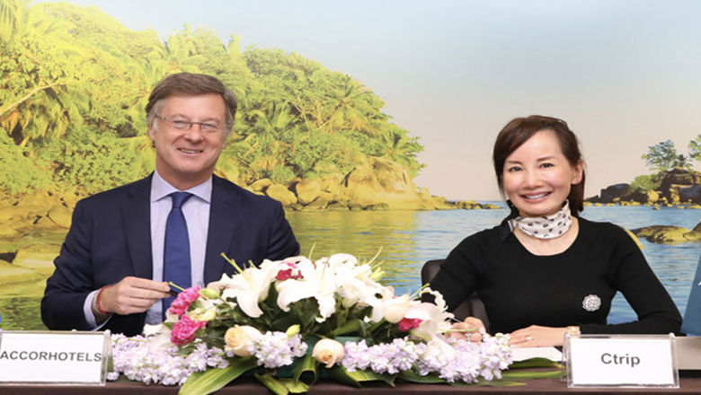 Signing ceremony between AccorHotels Chairman and CEO Sebastien Bazin and Ctrip CEO Jane Sun.
