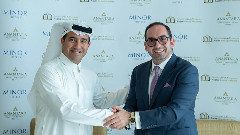 Abdulla Aujan, executive chairman of Aujan Group Holding (left), with Dillip Rajakarier, group CEO of Minor International and CEO of Minor Hotels, seal the deal for Anantara Downtown Dubai.