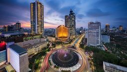 Budget cuts slash Jakarta hotel occupancy, pushing hospitality sector toward layoffs and losses.