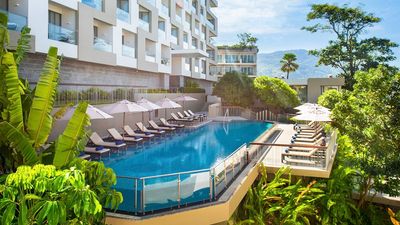 All rooms have a balcony offering views of the Andaman Sea or the swimming pool area.