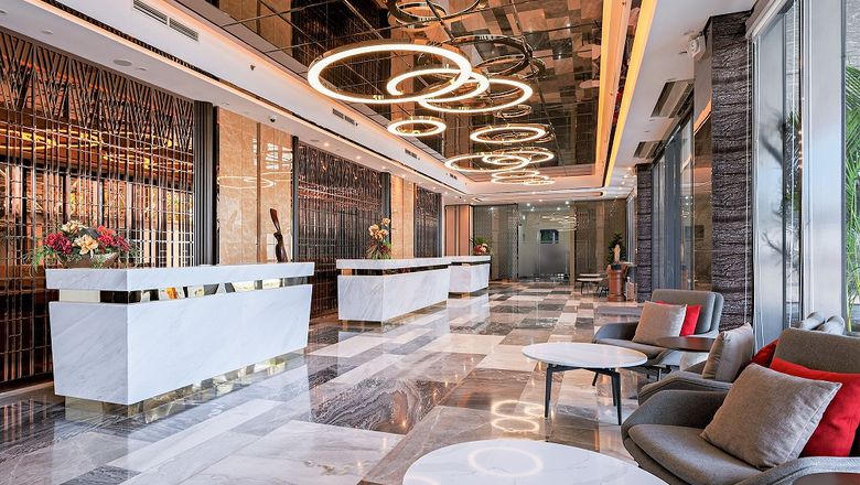 The lobby of Best Western Plus Metro Clark welcomes guests with a modern and inviting ambiance, showcasing a blend of style and functionality.