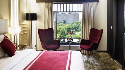 Best Western Plus Grand Hotel Multan’s deluxe room.