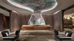 Illustrated streetscapes adorn the China Square hotel’s lobby, reflecting the heritage-led approach planned for its transformation into Hotel Stripes Singapore Chinatown.