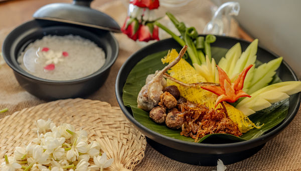 Khao Chae, a traditional Thai dish, offers a cooling respite during hot summers, complementing Capella Bangkok's luxurious Songkran festivities immersion.