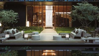 Kimpton Maa-Lai Bangkok is surrounded by verdant greenery.