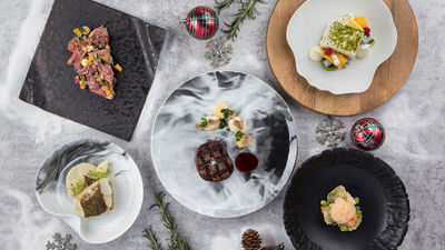 Grill 58’s Christmas menu features langoustine ravioli, roasted seabass and truffle crusted tenderloin.
