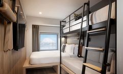 Moxy Niseko Village sits beside the Niseko Village Gondola, offering direct ski-in/ski-out access in one of Japan’s best-known powder-skiing destinations.