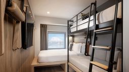 Moxy Niseko Village sits beside the Niseko Village Gondola, offering direct ski-in/ski-out access in one of Japan’s best-known powder-skiing destinations.