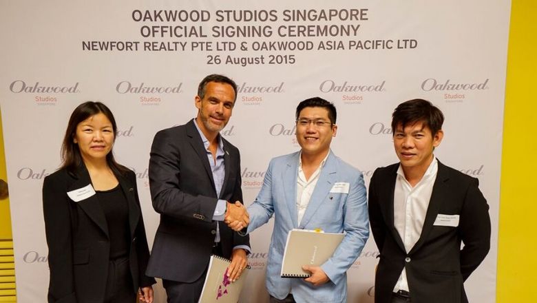 Oakwood Studios Singapore Official Signing Ceremony (From L-R: Yafang Bao, Chief Financial Officer, Oakwood Asia Pacific Ltd; Dean Schreiber, Managing Director, Oakwood Asia Pacific Ltd; Calvin Tan, Director, Newfort Realty Pte Ltd and Vincent Toe, Director, Newfort Realty Pte Ltd)
