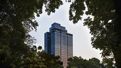 Park Hyatt Jakarta's surrounding area, Menteng, was originally conceived in the early 20th century as a garden city and is now known for its tree-lined streets and abundant greenery.