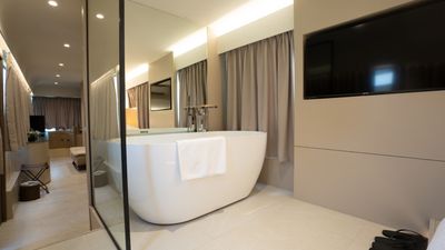 Guest rooms on the converted buses include rain showers, beds and bathtubs.