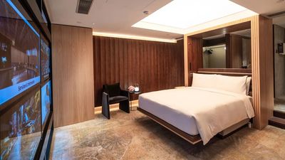 For sleep, the Murphy bed lowers, blackout curtains are controlled via an app, and soothing scents and mood lighting enhance the sleep environment.
