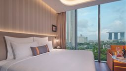 Guests staying at Pullman Singapore Hill Street can enjoy views of Fort Canning Park or Marina Bay, depending on the room's location within the U-shaped building.