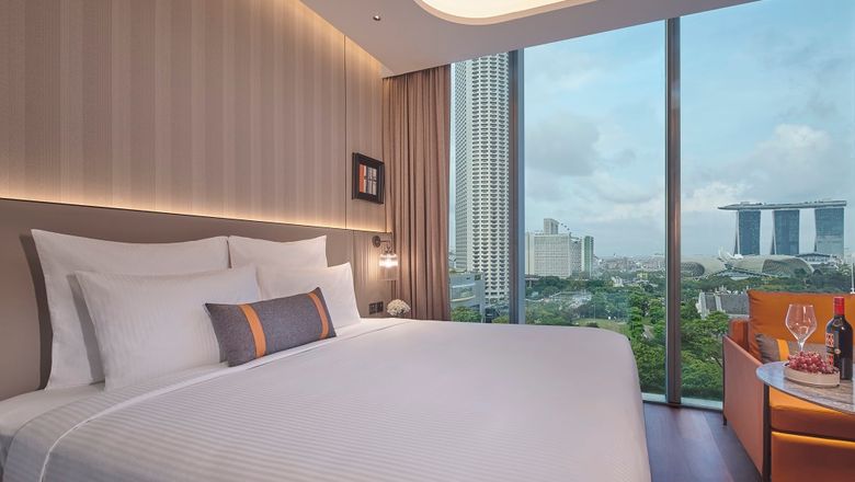 Guests staying at Pullman Singapore Hill Street can enjoy views of Fort Canning Park or Marina Bay, depending on the room's location within the U-shaped building.