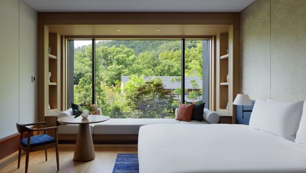 The King Deluxe room overlooks expansive views of the Takagamine mountains in northern Kyoto. The King Deluxe room overlooks expansive views of the Takagamine mountains in northern Kyoto.