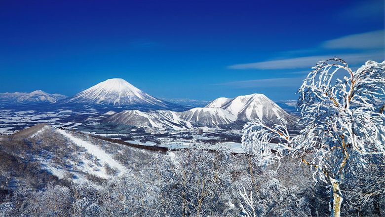 Aerial of Rusutsu Resort with Mount Yotei in background.
