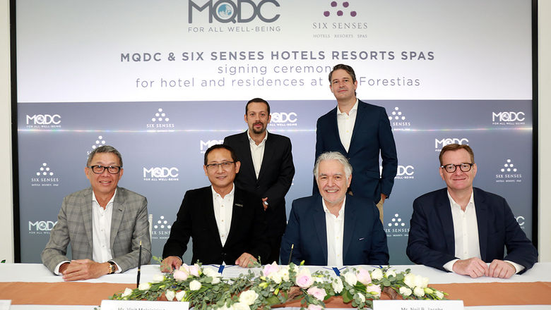 Front row photo from left: The developer’s president for hotels & hospitality, Chris Ow, and  MQDC CEO, Visit Malaisira, sign on behalf of the developer with Six Senses represented by Neil Jacobs, CEO and Bernhard Bohnenberger, president of Six Senses Hotels Resorts Spas. Behind from left: vice president development Omar Romero and chief financial officer Gordon Drake.