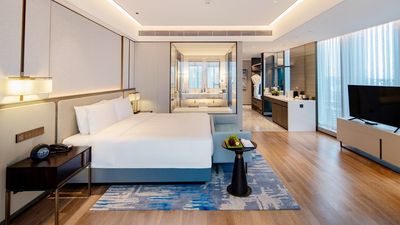 Wenlan Hotel features 295 rooms, fine dining, event spaces, a Presidential Suite, and modern amenities.