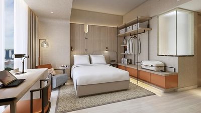 A rendering of a king bedroom in Wyndham Singapore.